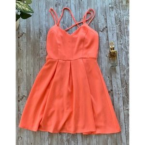 Ya Los Angeles neon peach flare mini dress